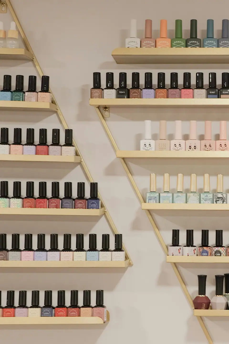 Shelves of nail polish bottles (stock photo)