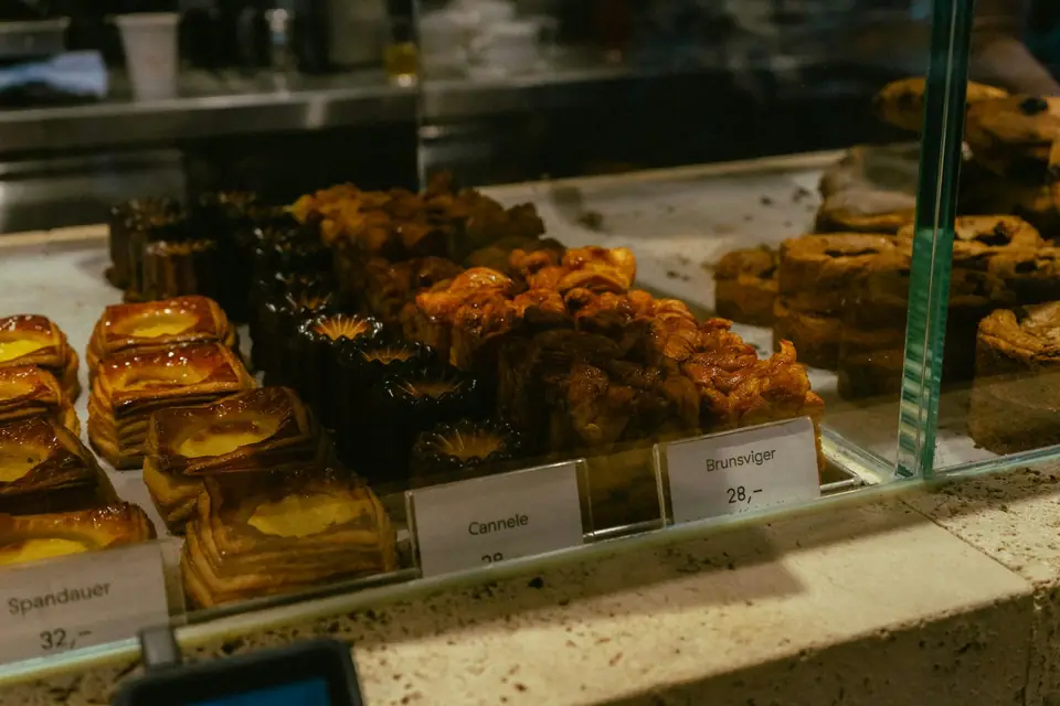 Pastries in a bakery display case (stock photo)