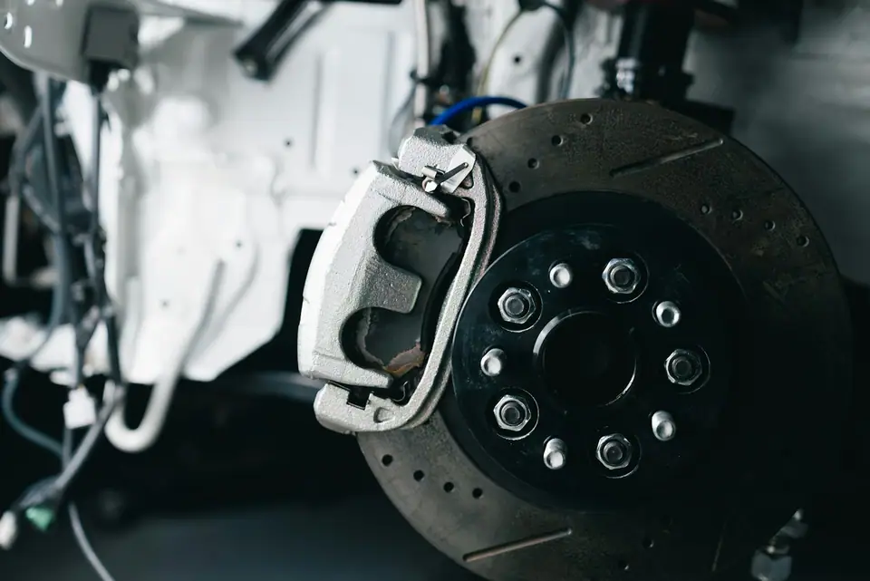Brake rotor and caliper close-up (stock photo)