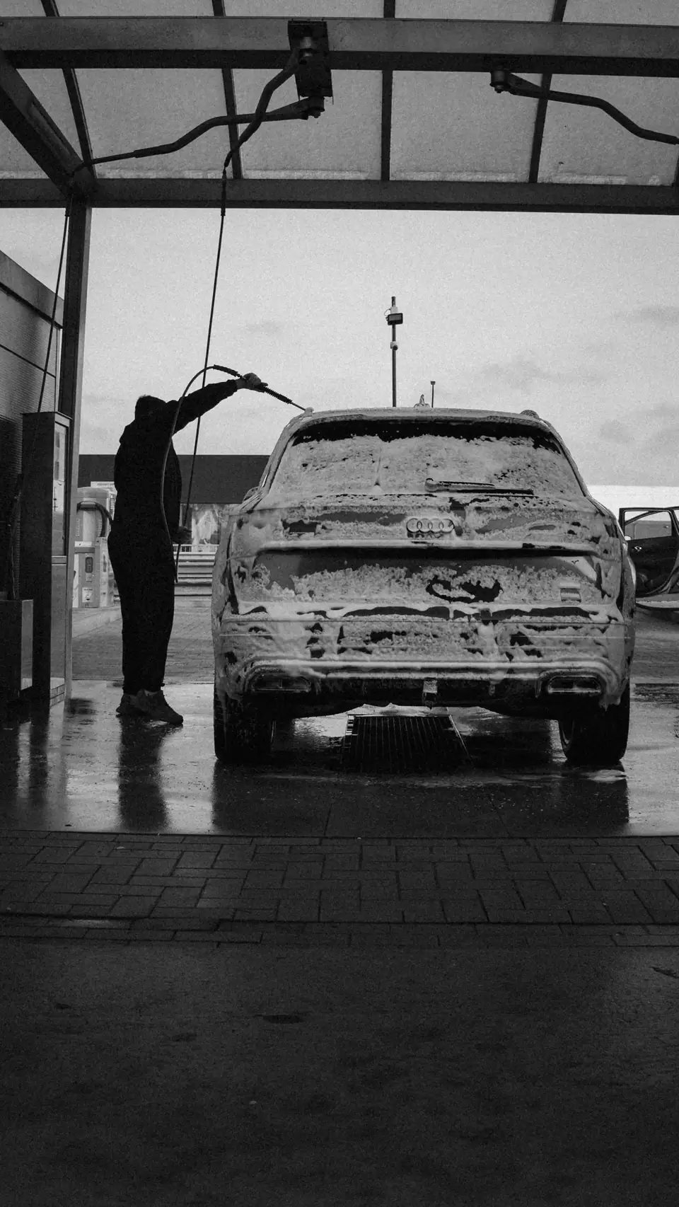 Car covered in wash foam (stock photo)